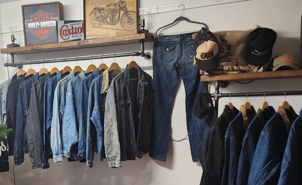 Selection of jean jackets hanging on a rail
